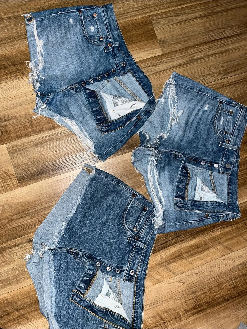 Women's Distressed Blue Denim Jean Shorts with Frayed Hem